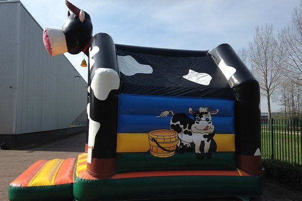 Bouncy castle cow with roof