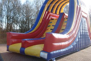 Inflatable slide with pool